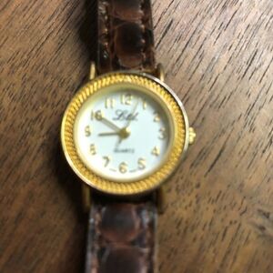 25.5 mm Ladies LTD watch. Brown leather band